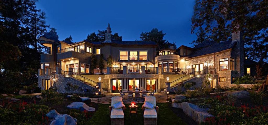 Prince Harry and Meghan Markle spent their first Christmas with baby Archie in a .1 million waterfront Canadian mansion owned by a mystery multi-millionaire. The couple were joined by Meghans mum Doria Ragland at one of the most idyllic spots on Vancouver Island, Canada on December 2019. The eight-bedroom gated estate boasts two beaches and views across the peninsula from the four-acre property. Locals in the islands rural community of North Saanich noticed cameras and fences erected at the property as early as December 19th, and the mansion is now swarming with security guards. One officer from the couples royal protection team was spotted patrolling the roads dressed in a Barbour jacket and driving a black Range Rover, and two other British guards were seen flying out from nearby Victoria International Airport. The French country-inspired mansion has a 11,416 square foot main house with five bedrooms and eight bathrooms and a 2,349 square foot guest cottage with three beds and two baths. Inside the main house is a formal dining room, panelled office with fireplace, large two-storey living room opening to a chefs kitchen with pizza oven, a games room with wet bar, media room and wine tasting room. The property was then bought around 2010 by Bernadette Wolfswinkel - the ex-wife of disgraced Arizona property magnate Conley Wolfswinkel. In 2012, it was put up for sale for .1 million and sold to a mysterious and extremely wealthy businessman around that time. Photo by ABACAPRESS.COM Prince Harry Harry de Galles Prince Harry de Galles Harry of Wales Prince Harry Prince Harry of Wales Duke of Sussex Duc de Sussex Prince Harry Duke of Sussex Prince Harry of Wales Harry of Wales Candid Pap Planque Meghan Markle Duchess of Sussex Markle Meghan Duchesse de Sussex Duchess of Sussex Markle Meghan | 714375_014 Canada